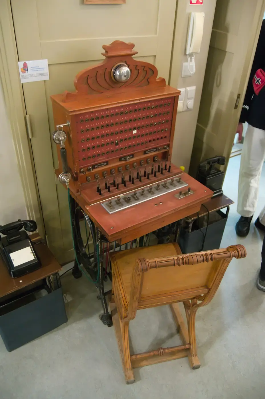 A wooden L.M. Ericsson manual telephone exchange from the early 1900s in a museum